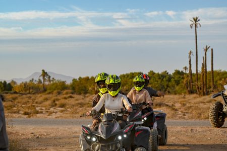 quad marrakech biking tour in the Palmeraie through desert trails surrounded by palm trees